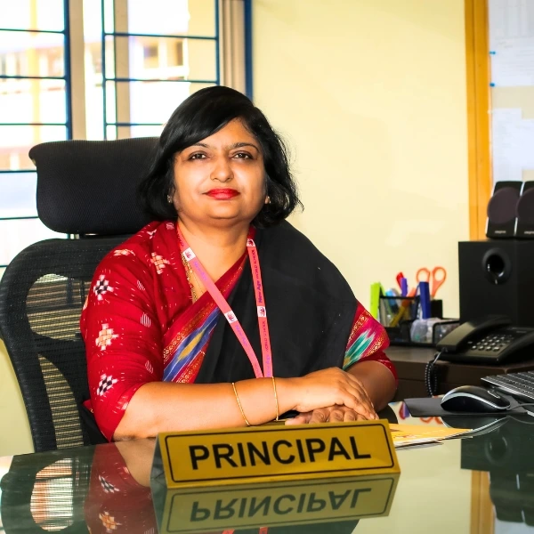Mrs. Sujita G Nayak, Principal of NewAge World School, highlighting the school's excellence as the Best International School in Yelahanka.